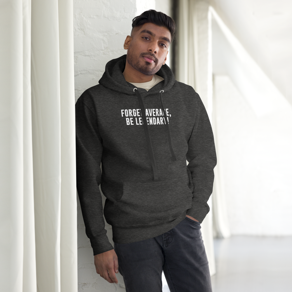 "Forget Average, Be Legendary!" printed on a charcoal heather unisex hoodie worn by a male