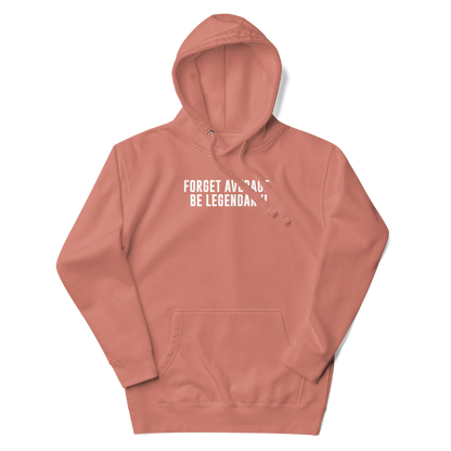"Forget Average, Be Legendary!" printed on a dusty rose unisex hoodie laying on a flat surface with the hood up