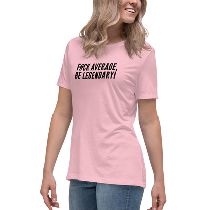 "F#Ck Average, Be Legendary!" printed on a pink women's relaxed t-shirt worn by a female