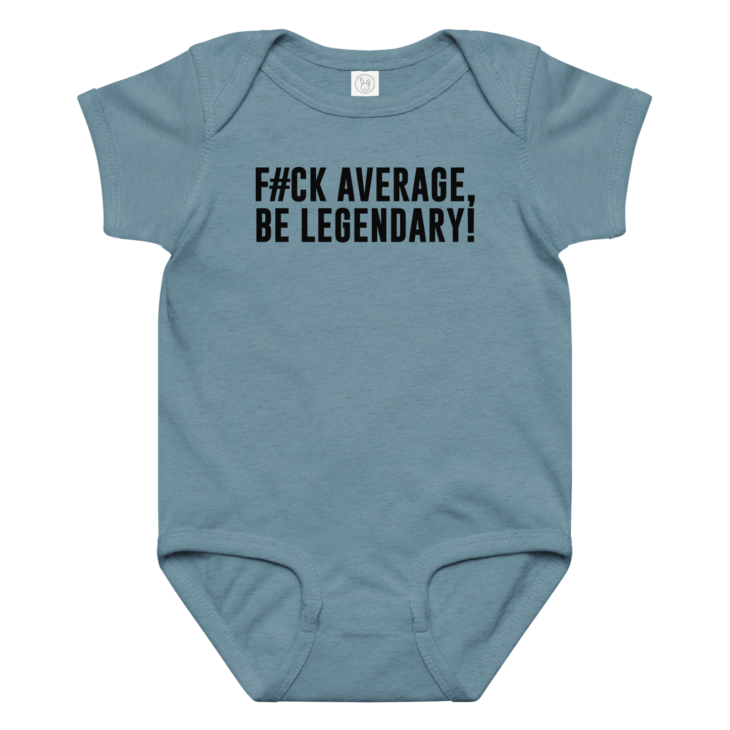 "F#Ck Average, Be Legendary!" printed on a vintage indigo baby jersey bodysuit laying on a flat surface amongst other clothes