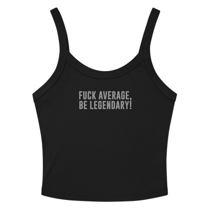 "Fuck Average, Be Legendary!" printed on a solid black blend women's micro-rib tanktop laying on a flat surface amongst sunglasses and shorts