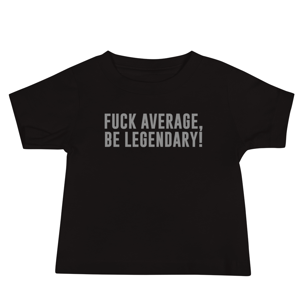 "Fuck Average, Be Legendary!" printed on a black baby jersey short sleeve tee laying on a flat surface