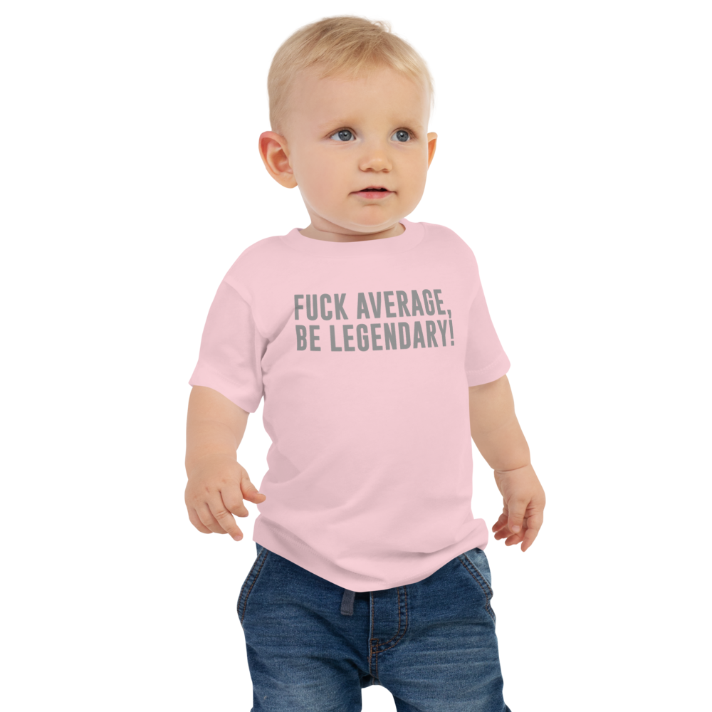 "Fuck Average, Be Legendary!" printed on a pink baby jersey short sleeve tee worn by a male