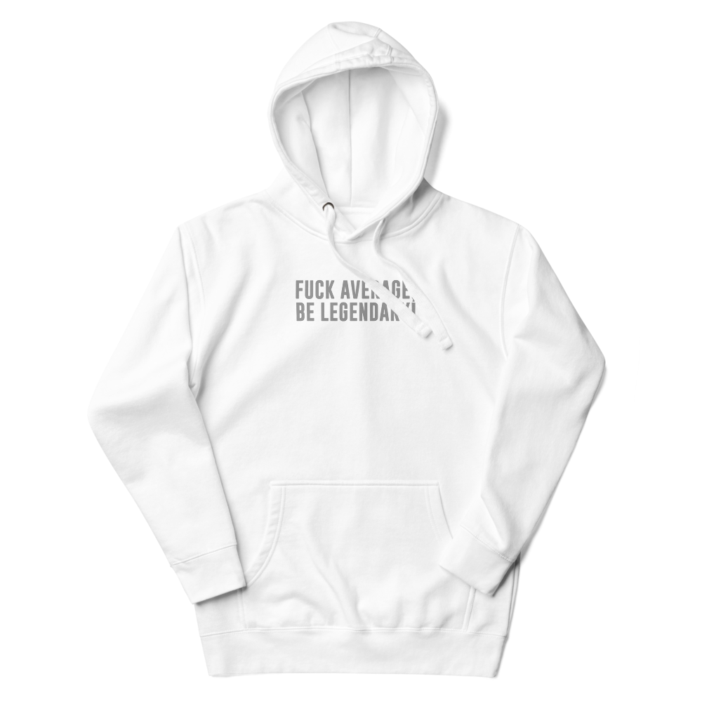 "Fuck Average, Be Legendary!" printed on a white unisex hoodie laying on a flat surface with the hood up