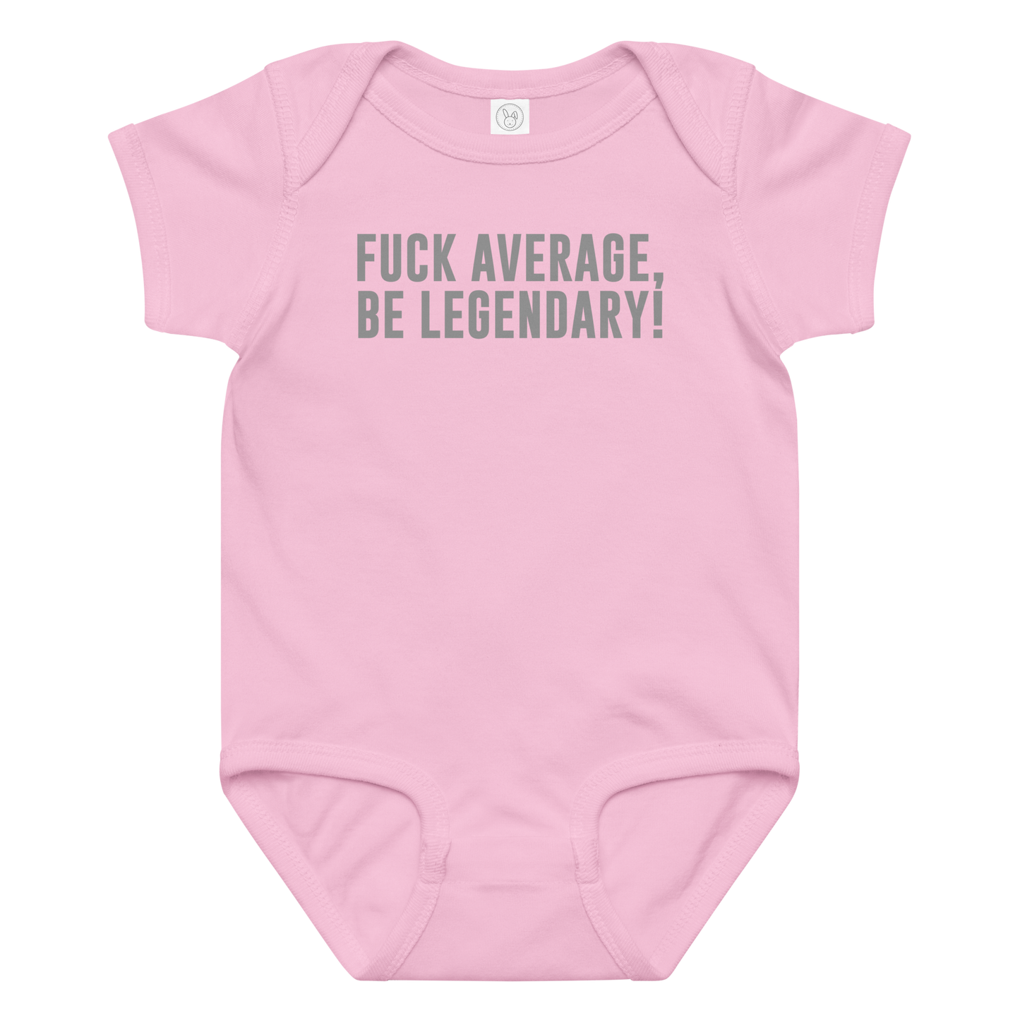 "Fuck Average, Be Legendary!" printed on a pink baby jersey bodysuit laying on a flat surface amongst other clothes