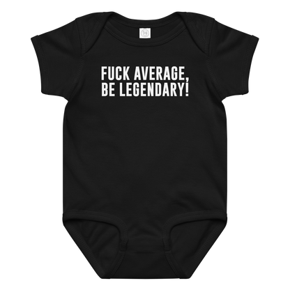 "Fuck Average, Be Legendary!" printed on a black baby jersey bodysuit laying on a flat surface amongst other clothes