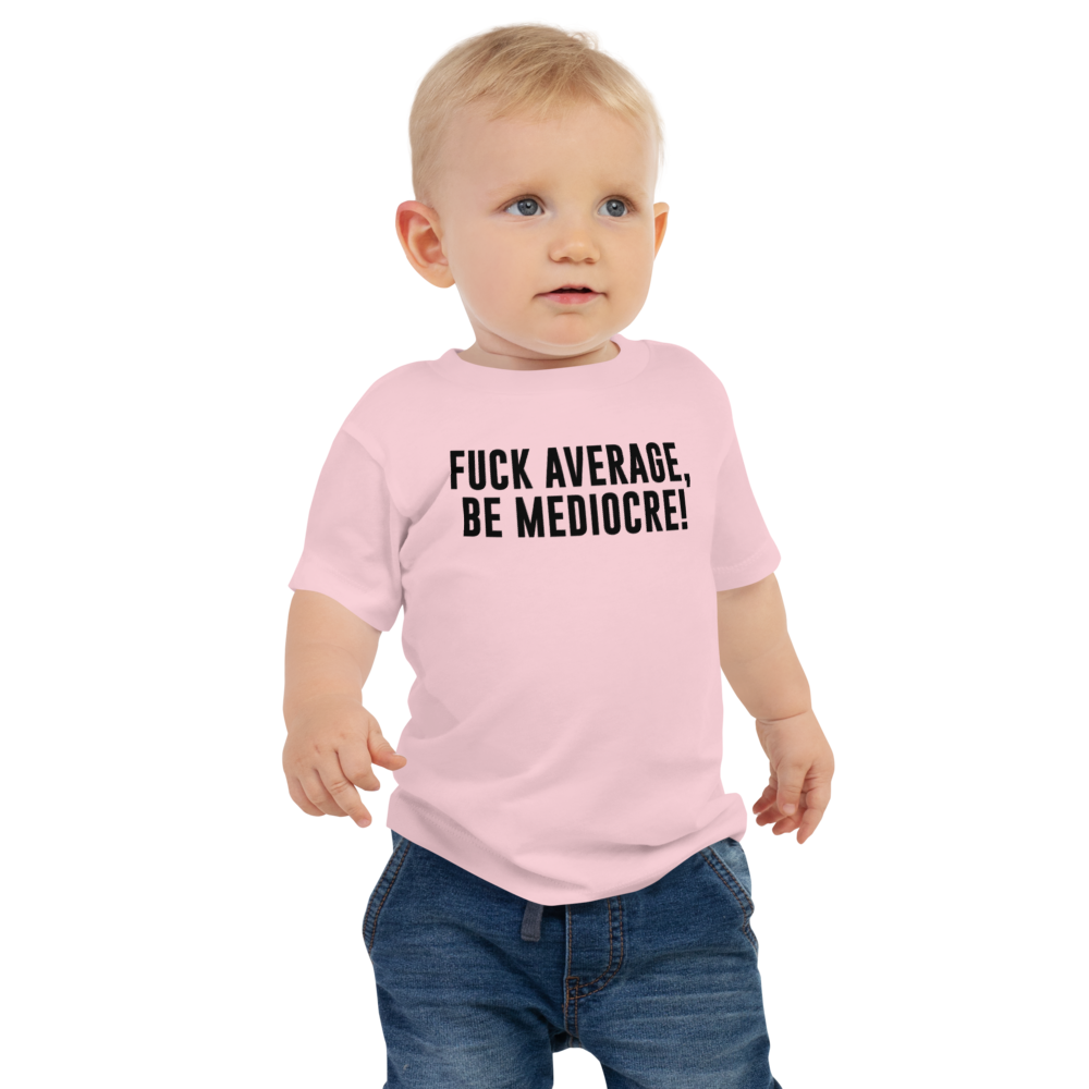 "Fuck Average, Be Mediocre!" printed on a pink baby jersey short sleeve tee worn by a male