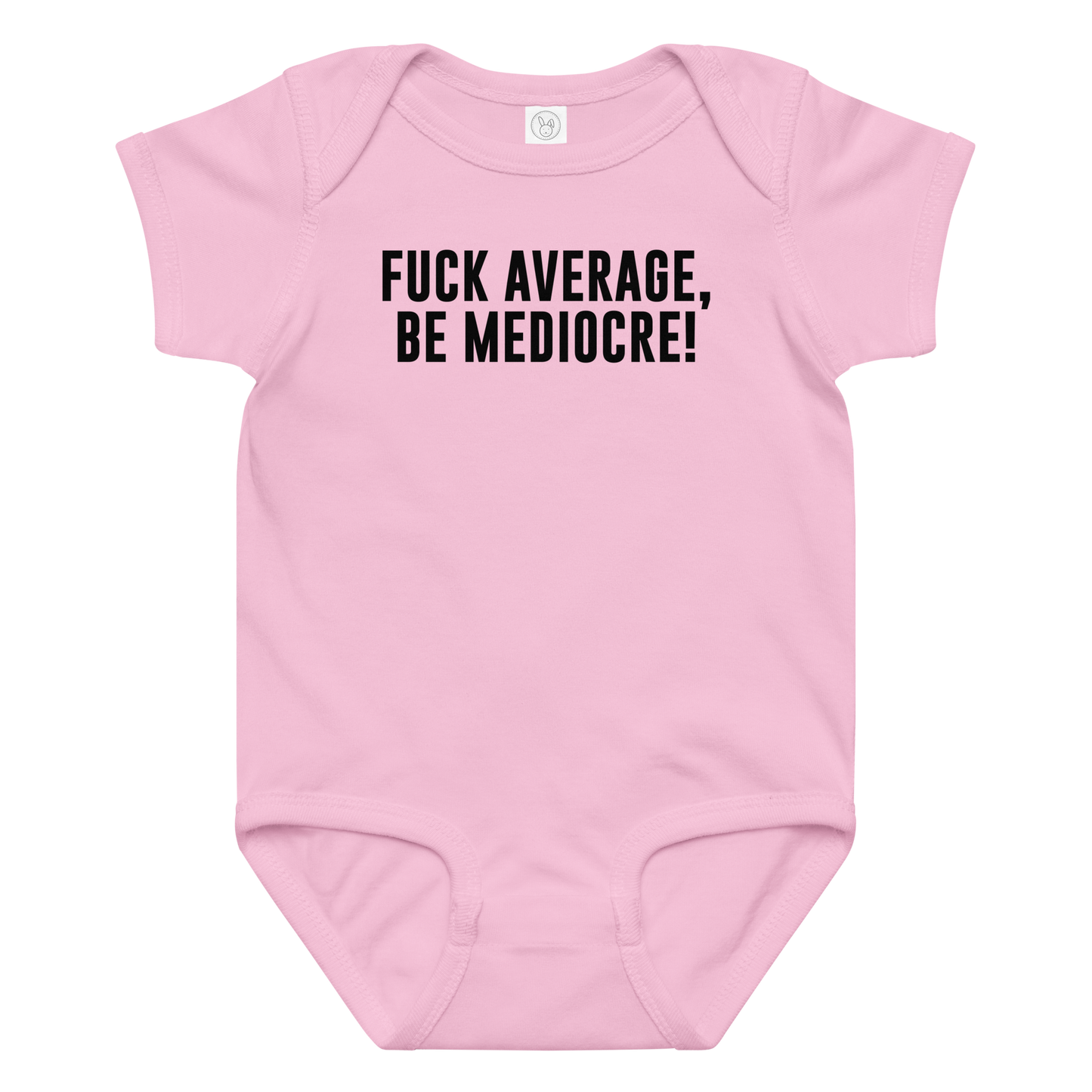 "Fuck Average, Be Mediocre!" printed on a pink baby jersey bodysuit laying on a flat surface amongst other clothes
