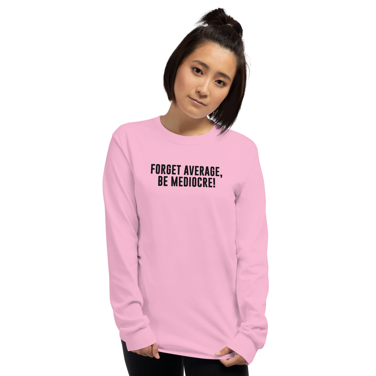 "Forget Average, Be Mediocre!" printed on a light pink men's long sleeve shirt worn by a female
