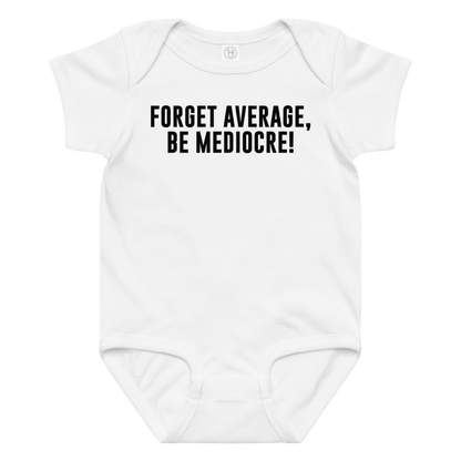 "Forget Average, Be Mediocre!" printed on a white baby jersey bodysuit laying on a flat surface amongst other clothes