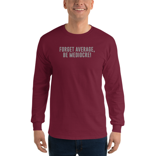 "Forget Average, Be Mediocre!" printed on a maroon men's long sleeve shirt worn by a male