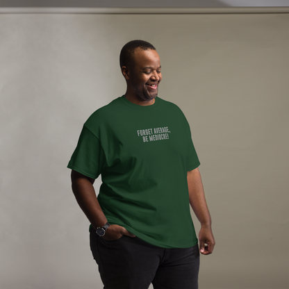 "Forget Average, Be Mediocre!" printed on a forest green unisex classic tee worn by a male