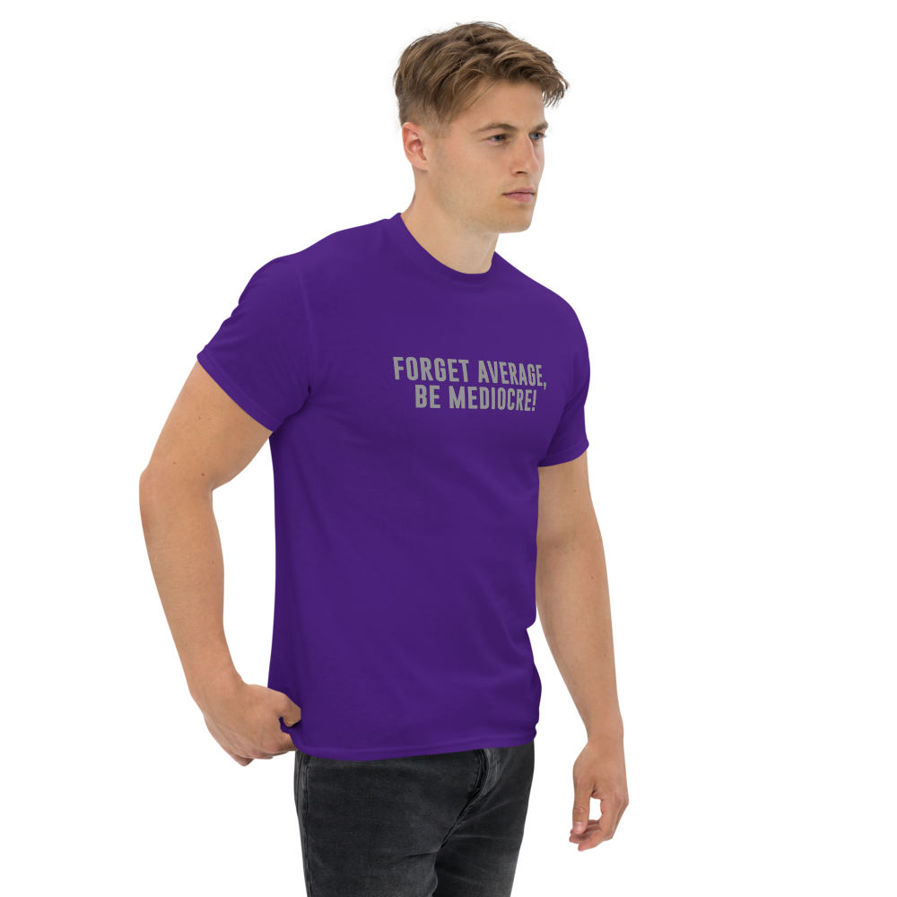 "Forget Average, Be Mediocre!" printed on a purple unisex classic tee worn by a male