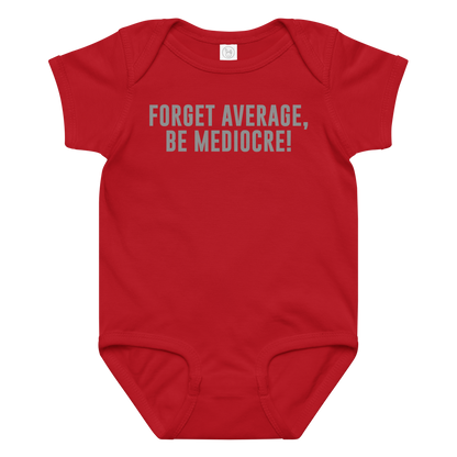 "Forget Average, Be Mediocre!" printed on a red baby jersey bodysuit laying on a flat surface amongst other clothes