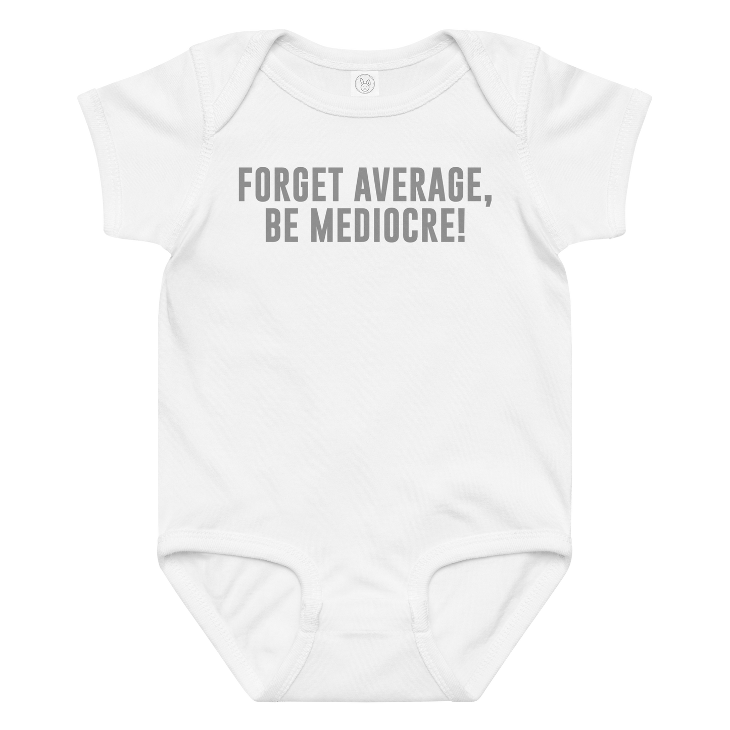 "Forget Average, Be Mediocre!" printed on a white baby jersey bodysuit laying on a flat surface amongst other clothes