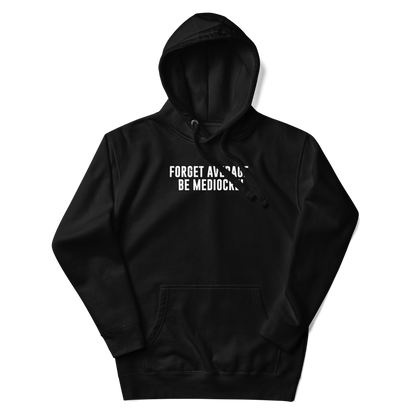 "Forget Average, Be Mediocre!" printed on a black unisex hoodie laying on a flat surface with the hood up