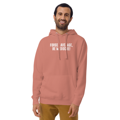 "Forget Average, Be Mediocre!" printed on a dusty rose warn by a male