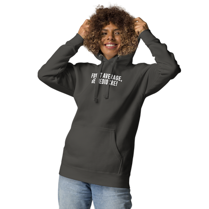 "Forget Average, Be Mediocre!" printed on a vintage black unisex hoodie worn by a female