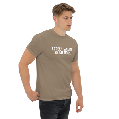 "Forget Average, Be Mediocre!" printed on a brown savana unisex classic tee worn by a male
