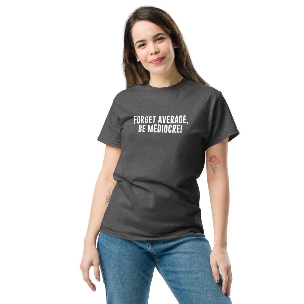 "Forget Average, Be Mediocre!" printed on a dark heather unisex classic tee worn by a female