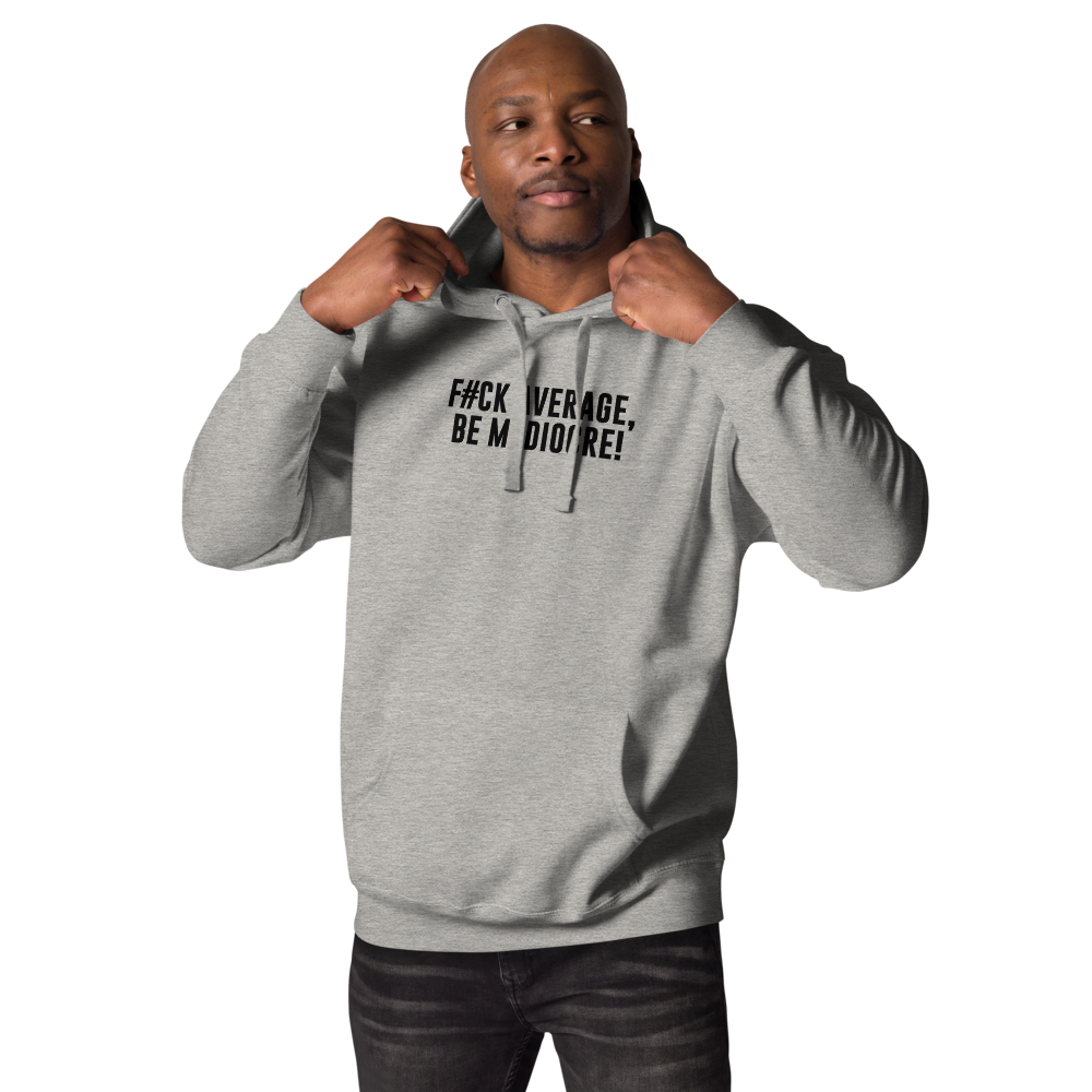 "F#Ck Average, Be Mediocre!" printed on a carbon grey unisex hoodie worn by a male