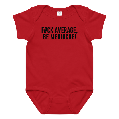 "F#Ck Average, Be Mediocre!" printed on a red baby jersey bodysuit laying on a flat surface amongst other clothes