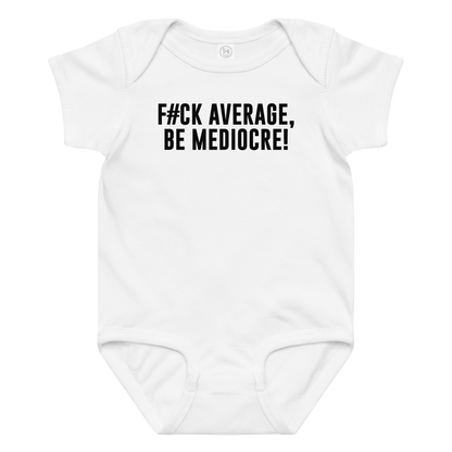 "F#Ck Average, Be Mediocre!" printed on a white baby jersey bodysuit laying on a flat surface amongst other clothes