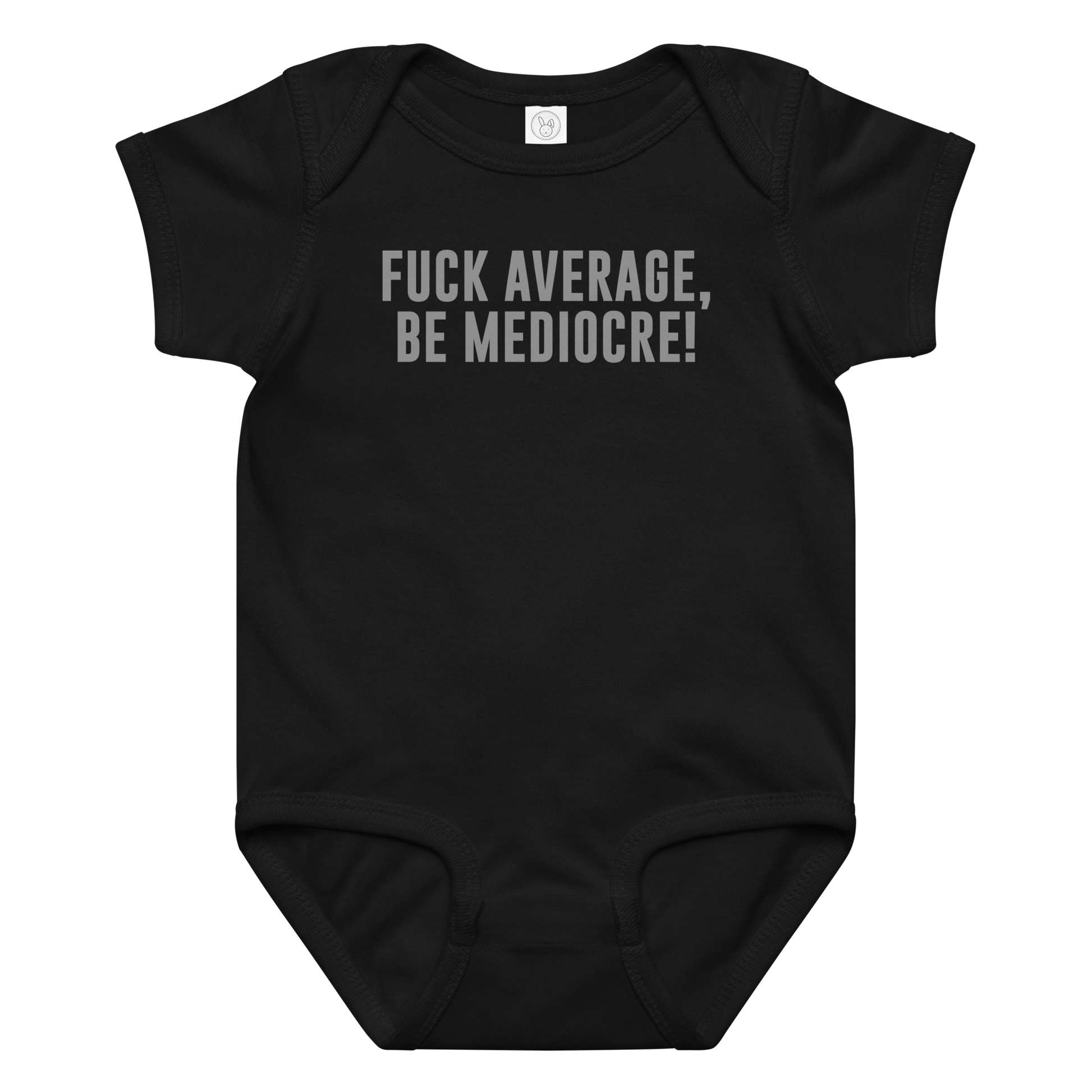 "Fuck Average, Be Mediocre!" printed on a black baby jersey bodysuit laying on a flat surface amongst other clothes