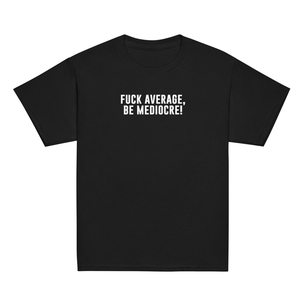 "Fuck Average, Be Mediocre!" printed on a black youth classic tee laying on a flat surface