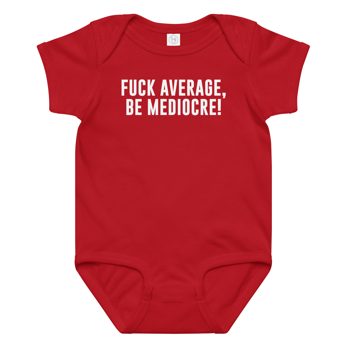 "Fuck Average, Be Mediocre!" printed on a red baby jersey bodysuit laying on a flat surface amongst other clothes