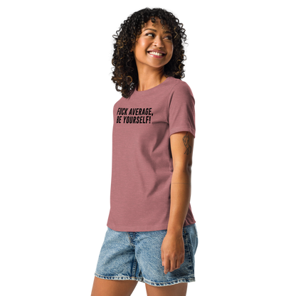 "Fuck Average, Be Yourself!" printed on a heather mauve women's relaxed t-shirt worn by a female