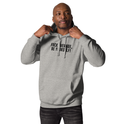 "Fuck Average, Be Yourself!" printed on a carbon grey unisex hoodie worn by a male