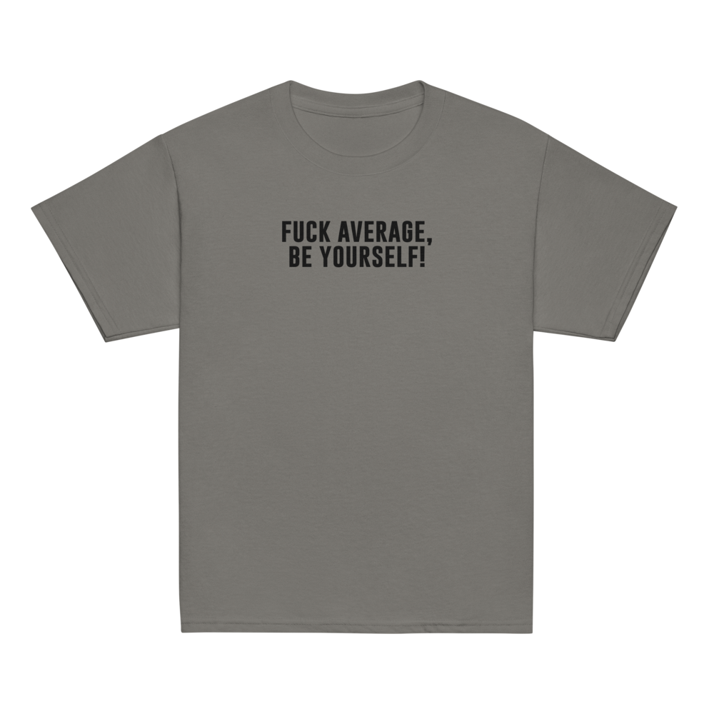 "Fuck Average, Be Yourself!" printed on a charcoal youth classic tee laying on a flat surface