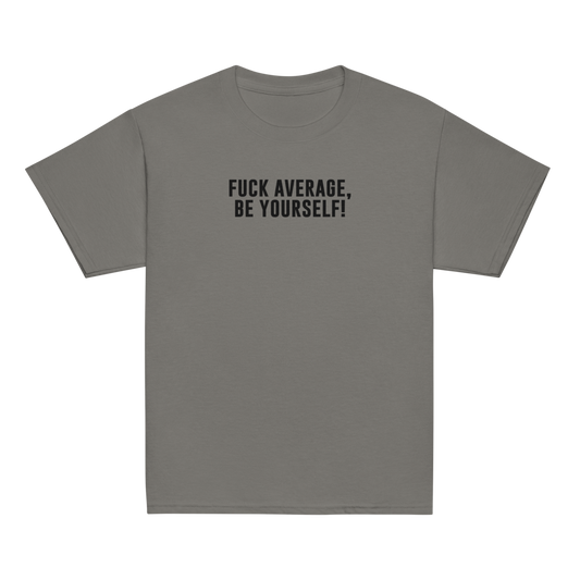 "Fuck Average, Be Yourself!" printed on a charcoal youth classic tee laying on a flat surface