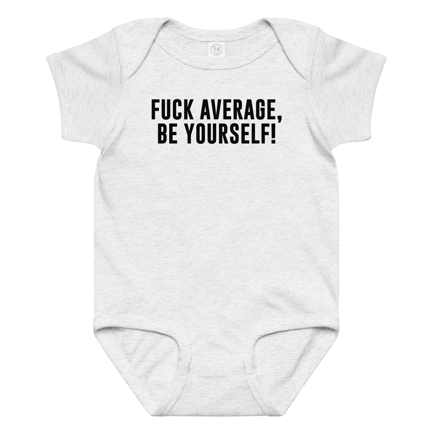 "Fuck Average, Be Yourself!" printed on a ash baby jersey bodysuit laying on a flat surface amongst other clothes