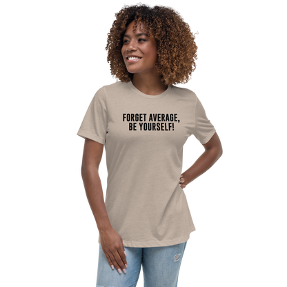 "Forget Average, Be Yourself!" printed on a heather stone women's relaxed t-shirt worn by a female