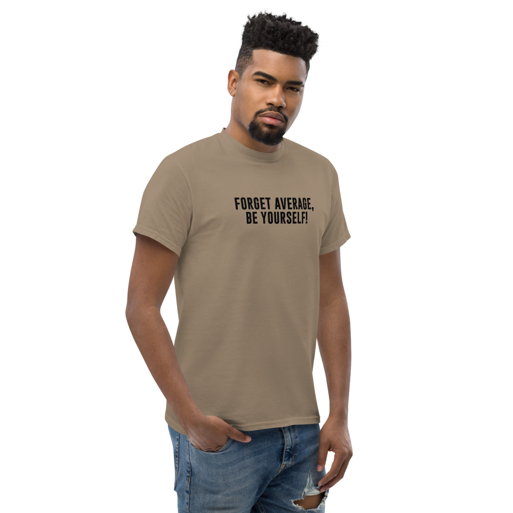 "Forget Average, Be Yourself!" printed on a brown savana unisex classic tee worn by a male