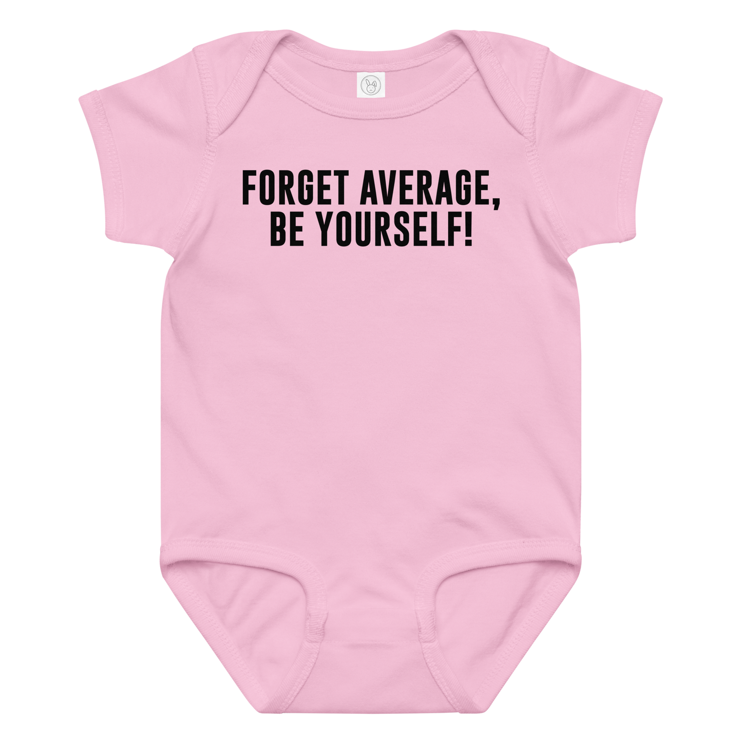 "Forget Average, Be Yourself!" printed on a pink baby jersey bodysuit laying on a flat surface amongst other clothes