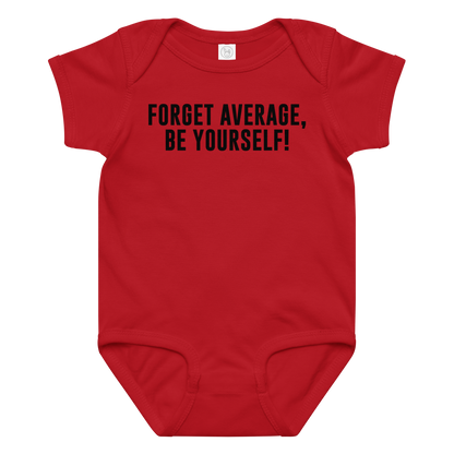 "Forget Average, Be Yourself!" printed on a red baby jersey bodysuit laying on a flat surface amongst other clothes