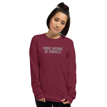 "Forget Average, Be Yourself!" printed on a maroon men's long sleeve shirt worn by a female