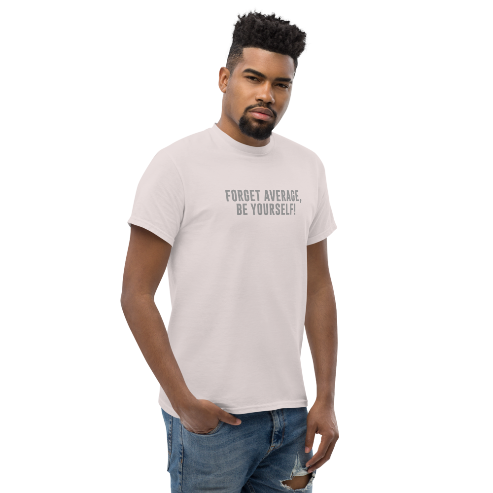 "Forget Average, Be Yourself!" printed on a ice grey unisex classic tee worn by a male