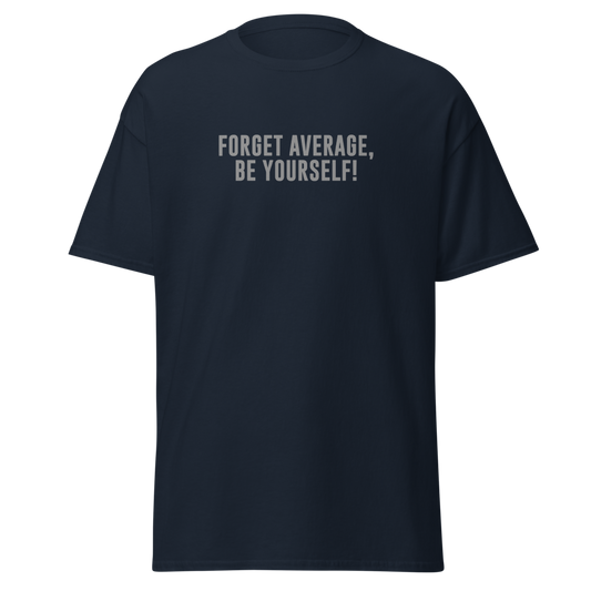 "Forget Average, Be Yourself!" printed on a navy unisex classic tee laying on a flat surface