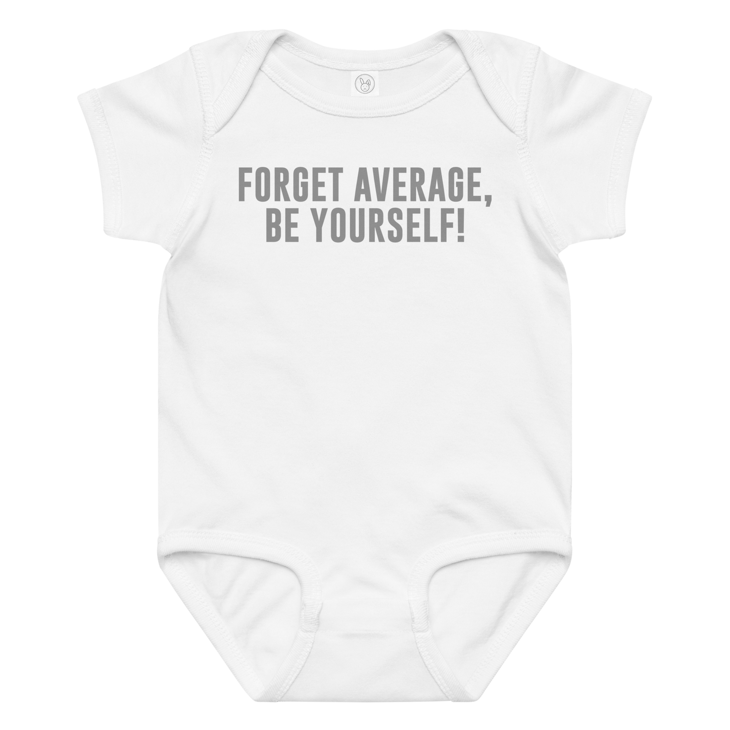 "Forget Average, Be Yourself!" printed on a white baby jersey bodysuit laying on a flat surface amongst other clothes