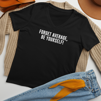 "Forget Average, Be Yourself!" printed on a solid black blend women's relaxed v-neck t-shirt laying on a flat surface amongst other clothes