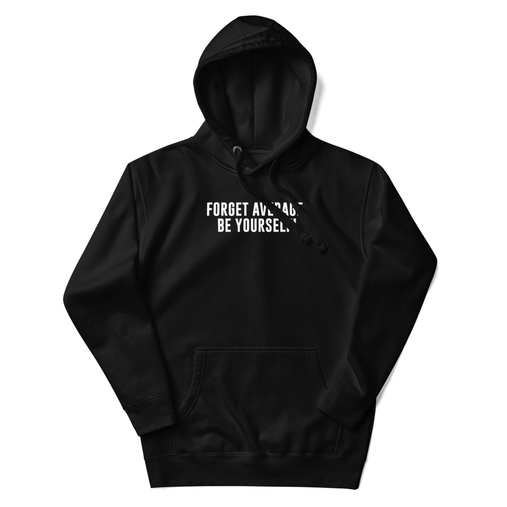 "Forget Average, Be Yourself!" printed on a black unisex hoodie laying on a flat surface with the hood up