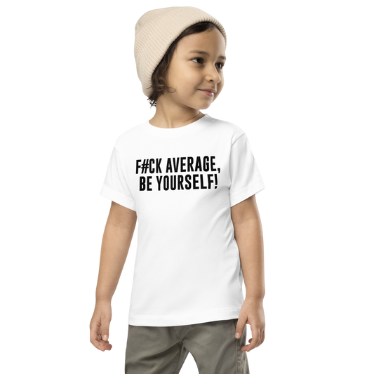"F#Ck Average, Be Yourself!" printed on a white toddler short sleeve tee worn by a male wearing a cap