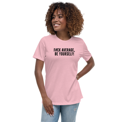 "F#Ck Average, Be Yourself!" printed on a pink women's relaxed t-shirt worn by a female