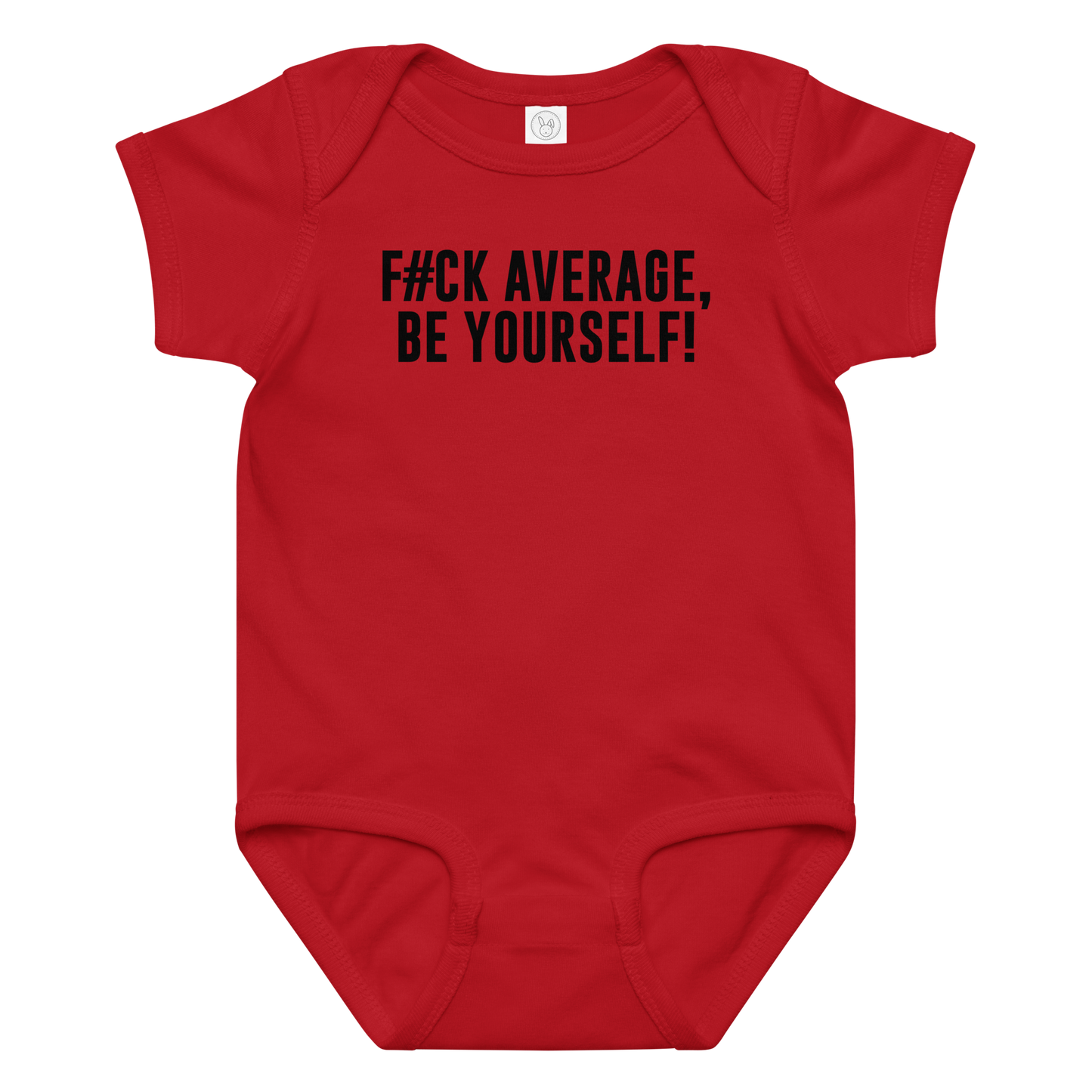 "F#Ck Average, Be Yourself!" printed on a red baby jersey bodysuit laying on a flat surface amongst other clothes