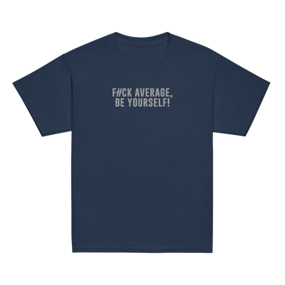 "F#Ck Average, Be Yourself!" printed on a navy youth classic tee laying on a flat surface