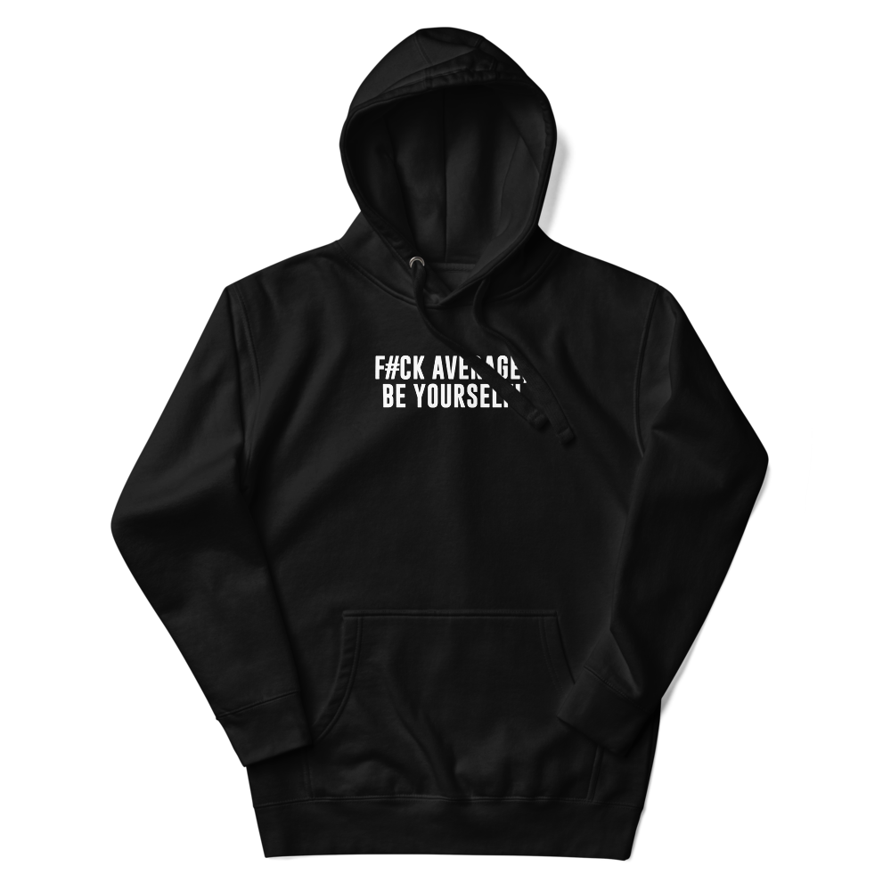 "F#Ck Average, Be Yourself!" printed on a black unisex hoodie laying on a flat surface with the hood up
